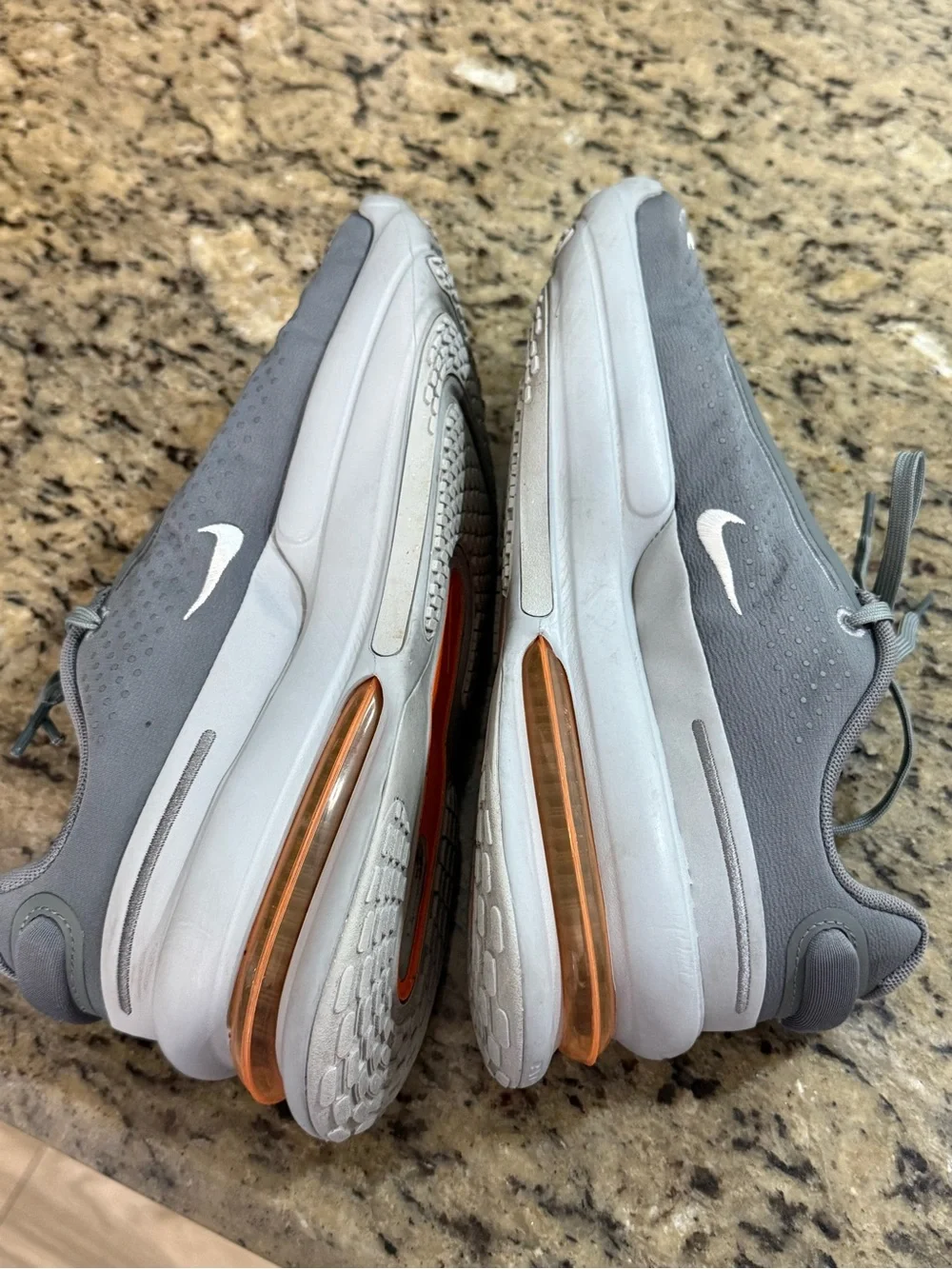 Nike Men’s Light Gray Athletic Sneakers with White Swoosh